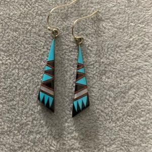 Sterling Silver dangling earrings.